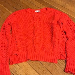 Red cable knit sweater